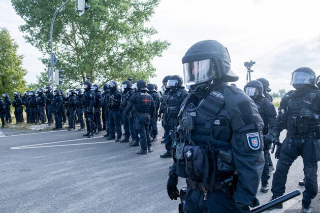 Mass demonstrations accompany AfD party congress in eastern Germany ERFURT, GERMANY - JULY 4: Protesters block the roads leading to the Messe Erfurt exhibition grounds during demonstrations against the federal party congress of the Alternative for Germany (AfD) in Erfurt, Germany, on July 4, 2026. Around 8:30 a.m., demonstrators established approximately nine coordinated blockades, occupying all major access routes to the congress venue in an attempt to prevent AfD delegates from reaching the event. More than police officers were deployed to secure the congress, clear blockades and maintain access to the venue. The AfD is a right-wing populist political party whose positions on immigration and national identity have made it one of Germany s  Copyright: x2026xAnadoluxMouafakxMahmaljix
