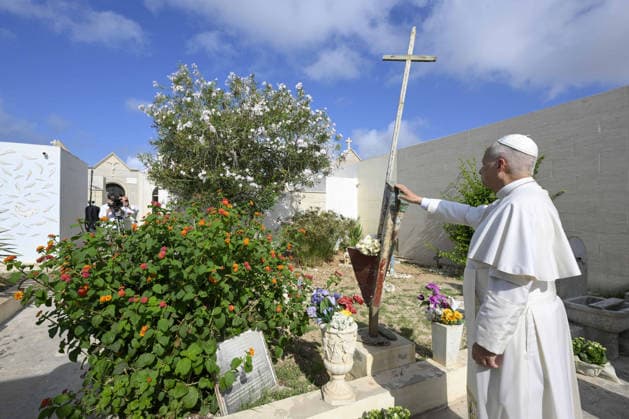 Pope Leo XIV Visits The Southern Italian Island of Lampedusa Pope Leo XIV visits the cemetery of the southern Italian island of Lampedusa which also has an area with tombs dedicated to the migrants who have lost their life at sea on July 4, 2026. Pope Leo XIV landed in Lampedusa for a pastoral visit to the southern Italian island at the crossroads of migrations routes from North Africa to Europe. Photo by (EV) Simone Risoluti Vatican Media ABACAPRESS.COM Lampedusa Italy  Copyright: xABACAx