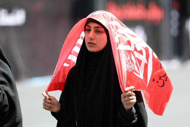 IRAN, TEHRAN - JULY 4, 2026: A woman is seen outside the Grand Mosalla of Tehran (Imam Khomeini Mosalla of Tehran) ahead of the state funeral of Iranian Supreme Leader Ayatollah Ali Khamenei. Khamenei was killed in a joint US-Israeli airstrike on February 28. Valery Sharifulin TASS  94646346