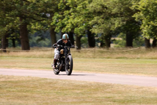 Alex Curtis on a Triumph CSD as The Vintage Speed Trials event is taking place at Grimsthorpe Castle in Lincolnshire. Featuring vintage cars and motorcycles it attracts hundreds of people to show off their vehicles, and many wear attire from the pre-war period. Vintage Speed Trials, Grimsthorpe Castle, Lincolnshire, on 4th July, 2026.  .