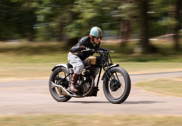 Alex Curtis on a Triumph CSD as The Vintage Speed Trials event is taking place at Grimsthorpe Castle in Lincolnshire. Featuring vintage cars and motorcycles it attracts hundreds of people to show off their vehicles, and many wear attire from the pre-war period. Vintage Speed Trials, Grimsthorpe Castle, Lincolnshire, on 4th July, 2026.  .