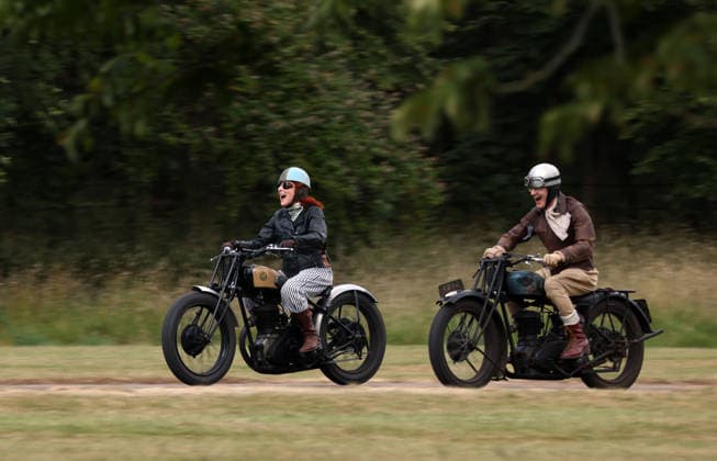 Alex Curtis on a Triumph CSD leads the way as The Vintage Speed Trials event is taking place at Grimsthorpe Castle in Lincolnshire. Featuring vintage cars and motorcycles it attracts hundreds of people to show off their vehicles, and many wear attire from the pre-war period. Vintage Speed Trials, Grimsthorpe Castle, Lincolnshire, on 4th July, 2026.  .