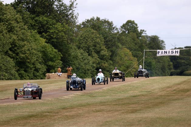 The Vintage Speed Trials event is taking place at Grimsthorpe Castle in Lincolnshire. Featuring vintage cars and motorcycles it attracts hundreds of people to show off their vehicles, and many wear attire from the pre-war period. Vintage Speed Trials, Grimsthorpe Castle, Lincolnshire, on 4th July, 2026.  .
