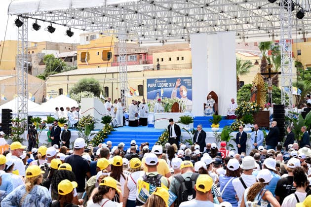 Pope Leo XIV visits the Southern Italian island of Lampedusa LAMPEDUSA, ITALY - JULY 04: People seen attending the homily in Lampedusa, Italy, on July 04, 2026. Pope Leo XIV arrived in Lampedusa to rise attention to the migrant issue and the unique position of the island. During his visit he met with a group of migrants, accompanied by the Red Cross at Favaloro Pier, inaugurating a new plaque with the new name of the Pier dedicated to Pope Francis. Later nearly 4000 people gathered in the sport field to attend the homily celebrated by the Pope. Valeria Ferraro Anadolu Lampedusa Italy. Editorial use only. Please get in touch for any other usage.  Copyright: x2026xAnadoluxValeriaxFerrarox