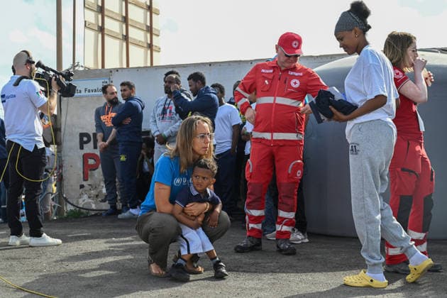 Pope Leo XIV visits the Southern Italian island of Lampedusa LAMPEDUSA, ITALY - JULY 04: Migrants arrive at the pier with the Red Cross on the occasion of Pope Leo XIV s visit to Lampedusa, Italy, on July 04, 2026. Pope Leo XIV arrived in Lampedusa to rise attention to the migrant issue and the unique position of the island on this matter. During his visit he met with a group of migrants, accompanied by the Red Cross at Favaloro Pier, inaugurating a new plaque with the new name of the Pier dedicated to Pope Francis. Later nearly 4000 people gathered in the sport field to attend the homily celebrated by the Pope. Valeria Ferraro Anadolu Lampedusa Italy. Editorial use only. Please get in touch for any other usage.  Copyright: x2026xAnadoluxValeriaxFerrarox