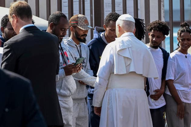 Pope Leo XIV visits the Southern Italian island of Lampedusa LAMPEDUSA, ITALY - JULY 04: Pope Leo XIV seen meeting migrants at Favaloro Pier on the occasion of his visit to Lampedusa, Italy, on July 04, 2026. Pope Leo XIV arrived in Lampedusa to rise attention to the migrant issue and the unique position of the island on this matter. During his visit he met with a group of migrants, accompanied by the Red Cross at Favaloro Pier, inaugurating a new plaque with the new name of the Pier dedicated to Pope Francis. Later nearly 4000 people gathered in the sport field to attend the homily celebrated by the Pope. Valeria Ferraro Anadolu Lampedusa Italy. Editorial use only. Please get in touch for any other usage.  Copyright: x2026xAnadoluxValeriaxFerrarox