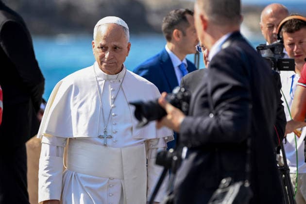 Pope Leo XIV visits the Southern Italian island of Lampedusa LAMPEDUSA, ITALY - JULY 04: Pope Leo XIV is seen at the Favaloro pier on the occasion of his visit to Lampedusa, Italy, on July 04, 2026. Pope Leo XIV arrived in Lampedusa to rise attention to the migrant issue and the unique position of the island on this matter. During his visit he met with a group of migrants, accompanied by the Red Cross at Favaloro Pier, inaugurating a new plaque with the new name of the Pier dedicated to Pope Francis. Later nearly 4000 people gathered in the sport field to attend the homily celebrated by the Pope. Valeria Ferraro Anadolu Lampedusa Italy. Editorial use only. Please get in touch for any other usage.  Copyright: x2026xAnadoluxValeriaxFerrarox