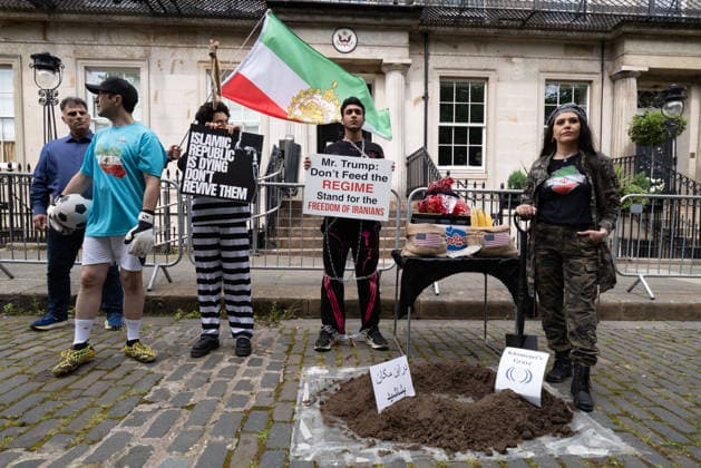 July 4, 2026, Edinburgh, Scotland, UK: Members of ScotlandÃ¢â‚¬â ¢s Iranian community opposed to the Islamic Republic demonstrated outside the U.S. Consulate in Edinburgh under the banner Ã¢â‚¬oeDonÃ¢â‚¬â ¢t Deal With TerroristsÃ¢â‚¬Â. Held to coincide with AmericaÃ¢â‚¬â ¢s Independence Day, the protestors argued that engaging with IranÃ¢â‚¬â ¢s Islamic Republic is contrary to AmericaÃ¢â‚¬â ¢s values and ideals. Edinburgh UK  - ZUMAs357 20260704_zip_s357_002 Copyright: xCameronxScottx
