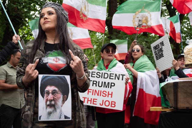 July 4, 2026, Edinburgh, Scotland, UK: Members of ScotlandÃ¢â‚¬â ¢s Iranian community opposed to the Islamic Republic demonstrated outside the U.S. Consulate in Edinburgh under the banner Ã¢â‚¬oeDonÃ¢â‚¬â ¢t Deal With TerroristsÃ¢â‚¬Â. Held to coincide with AmericaÃ¢â‚¬â ¢s Independence Day, the protestors argued that engaging with IranÃ¢â‚¬â ¢s Islamic Republic is contrary to AmericaÃ¢â‚¬â ¢s values and ideals. Edinburgh UK - ZUMAs357 20260704_zip_s357_029 Copyright: xCameronxScottx