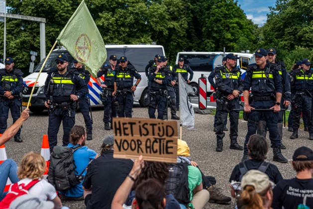 July 4, 2026, Utrecht, Utrecht, Netherlands: 4 July 2026, Utrecht, the Netherlands. Climate activists from Extinction Rebellion and Utrecht for Palestine block the A12 highway near Utrecht, Netherlands, demanding an end to billions in annual fossil fuel subsidies. Utrecht Netherlands - ZUMAp202 20260704_zip_p202_016 Copyright: xJamesxPetermeierx