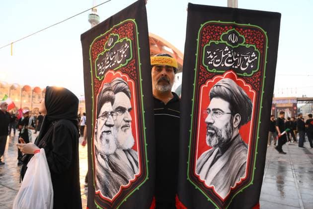 Iran Late Supreme Leader Funeral Rites 9200053 04.07.2026 People gather on the day of a public farewell ceremony to pay their respects to late Supreme Leader Ayatollah Ali Khamenei and his family members, who were killed in Israeli and U.S. airstrikes, in a square near the Imam Khomeini Mosque, also known as the Grand Mosalla Mosque, in Tehran, Iran. Ilya Pitalev Sputnik Tehran Iran  Copyright: xIlyaxPitalevx