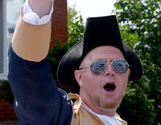 July 4, 2026, Racine, Wisconsin, USA: ZAK YAMOWICZ wears a Colonial era costume and flag sunglasses as Racine, Wisconsin hosts its 90th annual 4th of July parade on Main Street July 4, 2026.The theme was Ã¢â‚¬oeHappy 250 America. Racine USA  - ZUMAh154 20260704_znp_h154_010 Copyright: xMarkxHertzbergx
