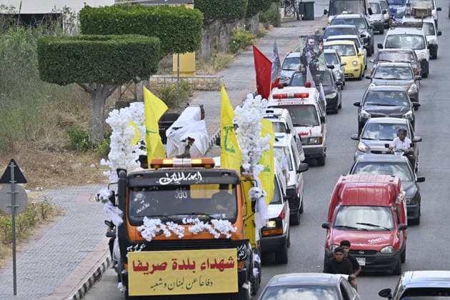 Funeral ceremony for Hezbollah members killed in Israeli attacks TYRE, LEBANON - JULY 4: General view of the funeral ceremony held for Hezbollah members killed during the Israeli attacks in Srifa district of Tyre, in southern Lebanon on July 4, 2026. Hezbollah flags and posters of the deceased were carried at the funeral. Houssam Shbaro Anadolu TYRE Lebanon. Editorial use only. Please get in touch for any other usage.  Copyright: x2026xAnadoluxHoussamxShbarox