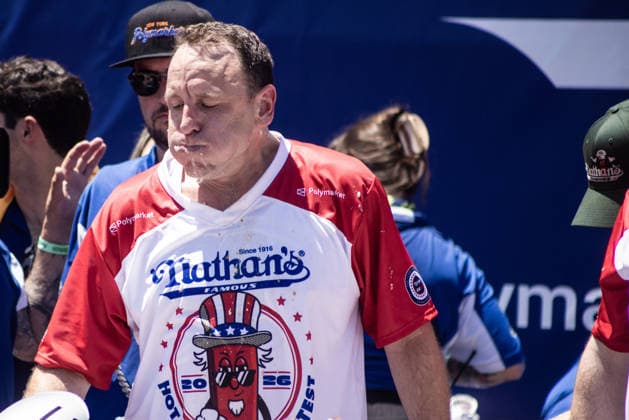 Joey Chestnut competes in the 110th Nathan s Famous Fourth of July International Hot Dog Eating Contest on Independence Day, Saturday, July 4, 2026 on Coney Island in New York City. Joey Chestnut won the championship and retains his title eating 70 hot dogs and buns.  NYP20260704802 JONATHANxFERNANDEZ