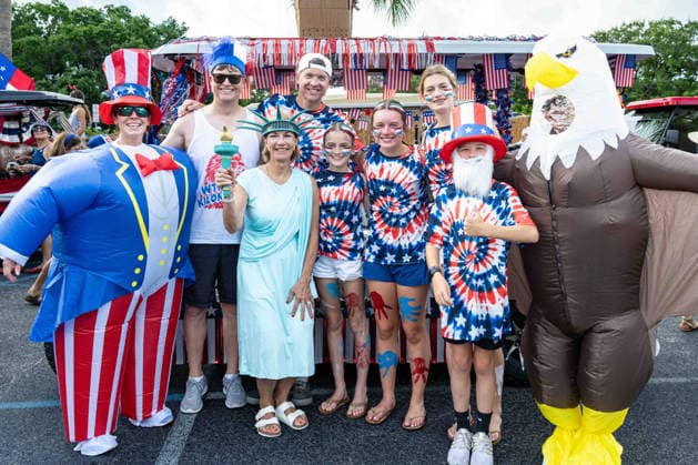 July 4, 2026, Sullivans Island, Sc, United States of America: Costumed participants pose by their patriotic themed golf cart float before the start of the annual Bicycle and Golf cart parade celebrating the 250th Independence Day, July 4, 2026 in Sullivans Island, South Carolina. Like most of the nation, South Carolina is under a heat dome with dangerously hot, humid weather. Sullivans Island United States of America  - ZUMAe02_ 20260704_zaf_e02_002 Copyright: xRichardxEllisx