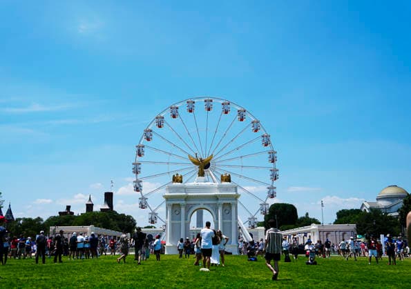 A ferris wheel greets visitors to the Great American State Fair on the National Mall during America s 250th anniversary celebrations in Washington DC on Saturday, July 4, 2026. High temperatures forced the cancellation of the annual July 4 parade.  WAP20260704508 BONNIExCASH