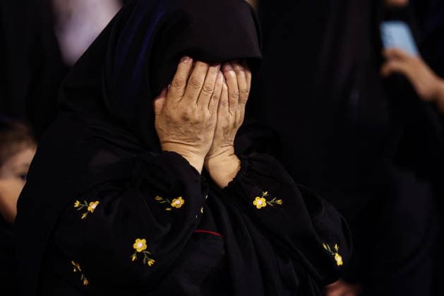 IRAN, TEHRAN - JULY 5, 2026: A woman weeps during the state funeral of Iranian Supreme Leader Ayatollah Ali Khamenei (1939-2026) at the Grand Mosalla of Tehran (Imam Khomeini Mosalla of Tehran). Khamenei was killed in a joint US-Israeli airstrike on February 28. Valery Sharifulin TASS  94668015