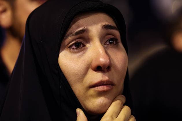 IRAN, TEHRAN - JULY 5, 2026: A woman weeps during the state funeral of Iranian Supreme Leader Ayatollah Ali Khamenei (1939-2026) at the Grand Mosalla of Tehran (Imam Khomeini Mosalla of Tehran). Khamenei was killed in a joint US-Israeli airstrike on February 28. Valery Sharifulin TASS  94668019