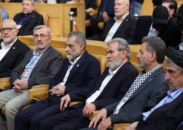 Iranian President Masoud Pezeshkian TEHRAN, IRAN - JULY 04: ( RESTRICTIONS: NO Access Israel Media Persian Language TV Stations Outside Iran Strictly No Access BBC Persian VOA Persian Manoto TV Iran International TV ) (----EDITORIAL USE ONLY – MANDATORY CREDIT - IRANIAN PRESIDENCY HANDOUT - NO MARKETING NO ADVERTISING CAMPAIGNS - DISTRIBUTED AS A SERVICE TO CLIENTS----) Palestinian Islamic Jihad Secretary-General Ziyad al-Nakhalah (3rd R) attends the Leader of Resistance: Imam Khomeini International Conference where Iranian President Masoud Pezeshkian delivered a speech in Tehran, Iran, on July 4, 2026. Iranian Presidency Handout Anadolu Tehran Iran. Editorial use only. Please get in touch for any other usage.  Copyright: x2026xAnadoluxIranianxPresidencyx xHandoutx