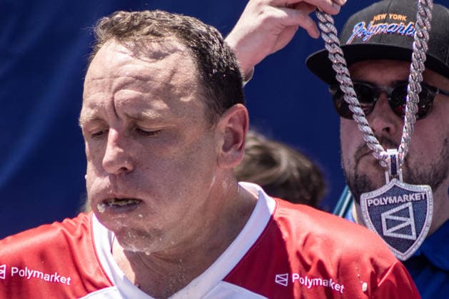 Joey Chestnut competes in the 110th Nathan s Famous Fourth of July International Hot Dog Eating Contest on Independence Day, Saturday, July 4, 2026 on Coney Island in New York City. Joey Chestnut won the championship and regains his title eating 70 hot dogs and buns.  NYP2026070480114 JONATHANxFERNANDEZ