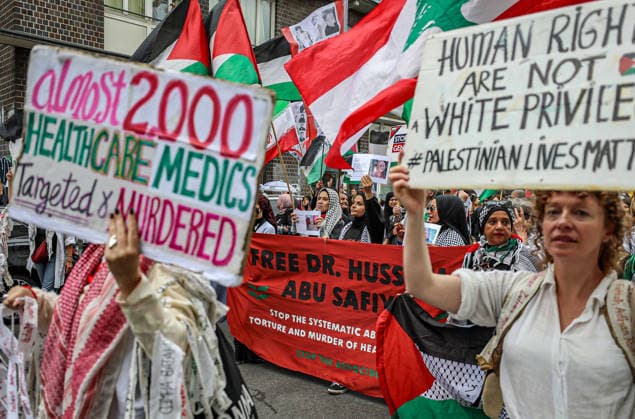 July 4, 2026, Berlin, Berlin, Germany: Berlin, Germany, July 4, 2026: Demonstrators take part in a pro-Palestinian march through central Berlin calling for an end to the war in Gaza, protection of medical workers, and the release of detained Palestinian doctor Hussam Abu Safiya. Participants carried Palestinian flags, banners and photographs during the demonstration. ZUMA Press Wire. Berlin Germany - ZUMAa268 20260704_zip_a268_005 Copyright: xAbdelrahmanxAlkahloutx
