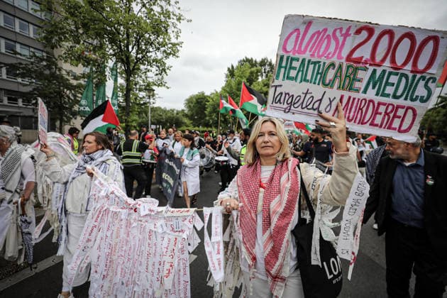 July 4, 2026, Berlin, Berlin, Germany: Berlin, Germany, July 4, 2026: Demonstrators take part in a pro-Palestinian march through central Berlin calling for an end to the war in Gaza, protection of medical workers, and the release of detained Palestinian doctor Hussam Abu Safiya. Participants carried Palestinian flags, banners and photographs during the demonstration. ZUMA Press Wire. Berlin Germany - ZUMAa268 20260704_zip_a268_007 Copyright: xAbdelrahmanxAlkahloutx