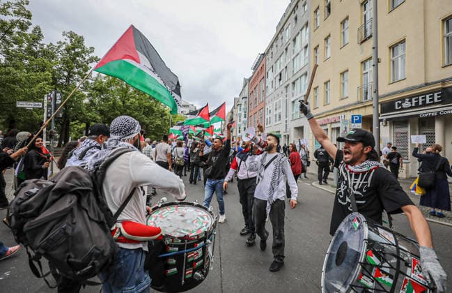 July 4, 2026, Berlin, Berlin, Germany: Berlin, Germany, July 4, 2026: Demonstrators take part in a pro-Palestinian march through central Berlin calling for an end to the war in Gaza, protection of medical workers, and the release of detained Palestinian doctor Hussam Abu Safiya. Participants carried Palestinian flags, banners and photographs during the demonstration. ZUMA Press Wire. Berlin Germany - ZUMAa268 20260704_zip_a268_008 Copyright: xAbdelrahmanxAlkahloutx