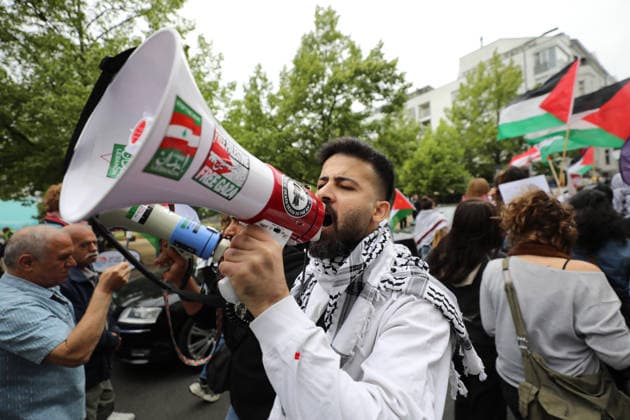 July 4, 2026, Berlin, Berlin, Germany: Berlin, Germany, July 4, 2026: Demonstrators take part in a pro-Palestinian march through central Berlin calling for an end to the war in Gaza, protection of medical workers, and the release of detained Palestinian doctor Hussam Abu Safiya. Participants carried Palestinian flags, banners and photographs during the demonstration. ZUMA Press Wire. Berlin Germany - ZUMAa268 20260704_zip_a268_009 Copyright: xAbdelrahmanxAlkahloutx