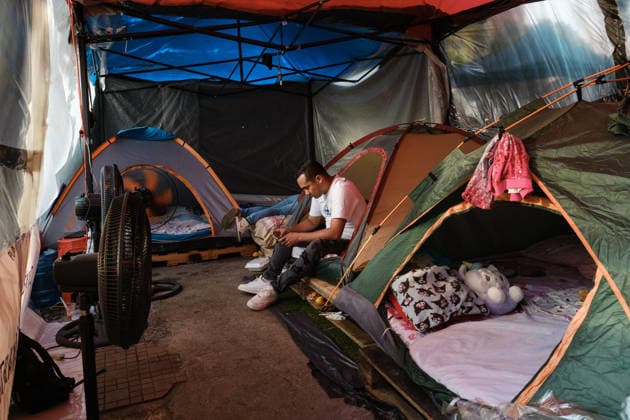 Evacuation of Venezuelan families continue after twin earthquakes CARACAS, VENEZUELA - JULY 4: Displaced Venezuelan families adjust to life inside temporary makeshift camps set up along the central Avenida Bolívar, near local museums, in Caracas, Venezuela, on July 4, 2026. Following the twin earthquakes, residents living in the state-subsidized Mision Vivienda housing complexes were urgently evacuated due to safety concerns. As emergency command continue processing requests for technical inspections, the displaced citizens await engineering assessments to determine whether their apartments are structurally sound for a safe return. Diko Betancourt Anadolu Caracas Venezuela. Editorial use only. Please get in touch for any other usage.  Copyright: x2026xAnadoluxDikoxBetancourtx