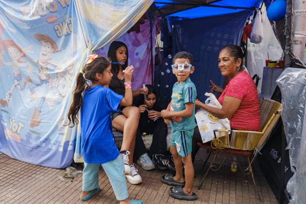 Evacuation of Venezuelan families continue after twin earthquakes CARACAS, VENEZUELA - JULY 4: Displaced Venezuelan families adjust to life inside temporary makeshift camps set up along the central Avenida Bolívar, near local museums, in Caracas, Venezuela, on July 4, 2026. Following the twin earthquakes, residents living in the state-subsidized Mision Vivienda housing complexes were urgently evacuated due to safety concerns. As emergency command continue processing requests for technical inspections, the displaced citizens await engineering assessments to determine whether their apartments are structurally sound for a safe return. Diko Betancourt Anadolu Caracas Venezuela. Editorial use only. Please get in touch for any other usage.  Copyright: x2026xAnadoluxDikoxBetancourtx