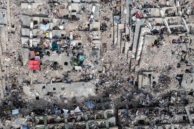 Aerial views reveal scale of devastation in Venezuela after twin earthquakes LA GUAIRA, VENEZUELA - JULY 4: An aerial view captures the catastrophic destruction across the Caraballeda and Caribe neighborhoods in the coastal city of La Guaira, Venezuela, on July 4, 2026, the area hardest hit by the recent 7.2 and 7.5 magnitude twin earthquakes. As emergency response teams continue searching the debris for survivors, the aerial footage underscores the severe impact of the disaster. Cem Tekkesinoglu Anadolu La Guaira Venezuela. Editorial use only. Please get in touch for any other usage.  Copyright: x2026xAnadoluxCemxTekkesinoglux
