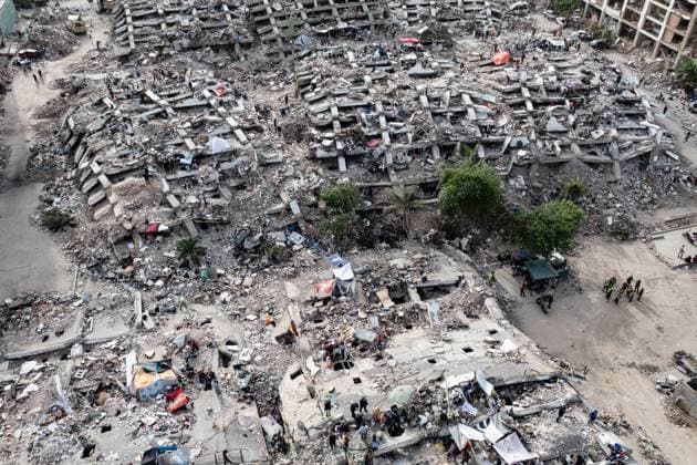 Aerial views reveal scale of devastation in Venezuela after twin earthquakes LA GUAIRA, VENEZUELA - JULY 4: An aerial view captures the catastrophic destruction across the Caraballeda and Caribe neighborhoods in the coastal city of La Guaira, Venezuela, on July 4, 2026, the area hardest hit by the recent 7.2 and 7.5 magnitude twin earthquakes. As emergency response teams continue searching the debris for survivors, the aerial footage underscores the severe impact of the disaster. Cem Tekkesinoglu Anadolu La Guaira Venezuela. Editorial use only. Please get in touch for any other usage.  Copyright: x2026xAnadoluxCemxTekkesinoglux