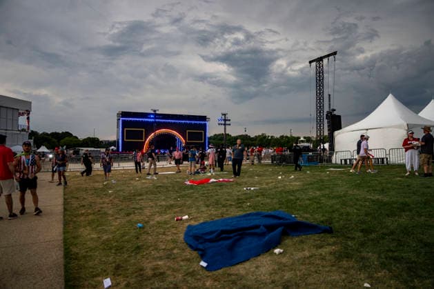 Items are left behind as attendees evacuate due to thunderstorms in the area during the Salute to America Independence Day celebration on the National Mall in Washington, DC, on July 4, 2026. The nation is marking the 250th anniversary of the United States Declaration of Independence.  WAP20260704338 BONNIExCASH