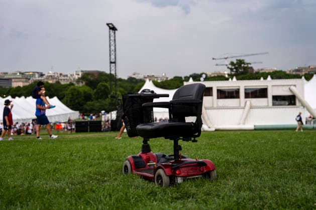 A motorized scooter is left behind as attendees evacuate due to thunderstorms in the area during the Salute to America Independence Day celebration on the National Mall in Washington, DC, on July 4, 2026. The nation is marking the 250th anniversary of the United States Declaration of Independence.  WAP20260704340 BONNIExCASH