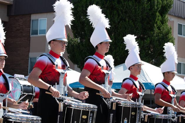 July 4, 2026, Provo, Utah, USA: Members of a high school marching band dressed in maroon and black uniforms play brass instruments while marching down the street during America s Freedom Festival Grand Parade in Provo, Utah, Saturday, July 4, 2026. The annual Independence Day event features expanded programming to honor the 250th anniversary of United States independence. Provo USA  - ZUMAm292 20260704_znp_m292_030 Copyright: xCharlesxMcClintockxWilsonx