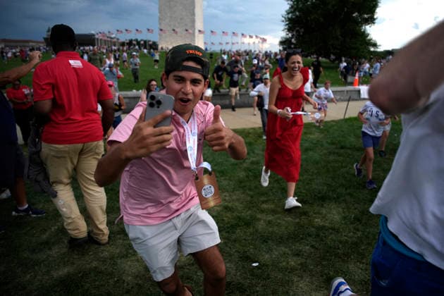 250th Independence Day Celebration evacuation - Washington Attendees run back to heir seats after thinking evacuate was canceled the Fourth of July celebrations marking the 250th anniversary of U.S. Independence due to the threat of sever weather near Washington Monument in Washington on July 4, 2026. Photo by Yuri Gripas ABACAPRESS.COM Washington DC United States  Copyright: xGripasxYuri ABACAx