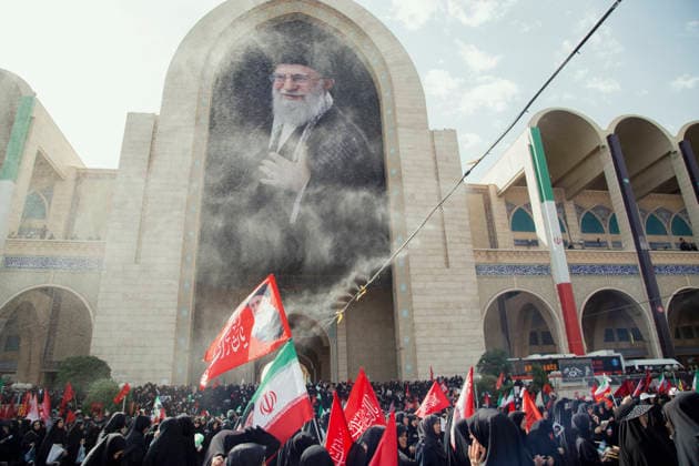 Tehran Iran Khamenei Funeral July 4 Mourners gather in the courtyard of the Imam Khomeini Grand Mosalla, decorated with a giant portrait of Iran s late Supreme Leader Ayatollah Ali Khamenei, during his funeral ceremony in Tehran, Iran, on July 4, 2026. Ayatollah Khamenei and members of his family were killed on February 28 in a U.S.-Israeli airstrike during the first day of a military campaign against the Islamic Republic. The attack brought an end to his 36-year rule, leading to a six-day multi-city state funeral and drawing thousands of mourners to pay their final respects. Tehran Tehran Iran Copyright: xHosseinxBerisx