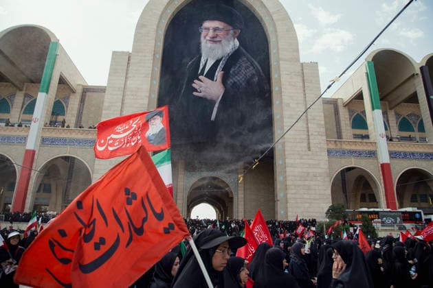 Tehran Iran Khamenei Funeral July 4 Mourners gather in the courtyard of the Imam Khomeini Grand Mosalla, decorated with a giant portrait of Iran s late Supreme Leader Ayatollah Ali Khamenei, during his funeral ceremony in Tehran, Iran, on July 4, 2026. Ayatollah Khamenei and members of his family were killed on February 28 in a U.S.-Israeli airstrike during the first day of a military campaign against the Islamic Republic. The attack brought an end to his 36-year rule, leading to a six-day multi-city state funeral and drawing thousands of mourners to pay their final respects. Tehran Tehran Iran Copyright: xHosseinxBerisx