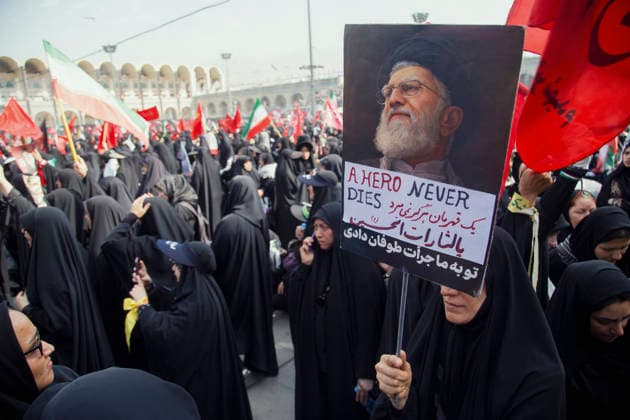 Tehran Iran Khamenei Funeral July 4 A mourner holds a poster of Iran s late Supreme Leader Ayatollah Ali Khamenei reading A HERO NEVER DIES during his funeral ceremony in the courtyard of the Imam Khomeini Grand Mosalla in Tehran, Iran, on July 4, 2026. Ayatollah Khamenei and members of his family were killed on February 28 in a U.S.-Israeli airstrike during the first day of a military campaign against the Islamic Republic. The attack brought an end to his 36-year rule, leading to a six-day multi-city state funeral and drawing thousands of mourners to pay their final respects. Tehran Tehran Iran Copyright: xHosseinxBerisx