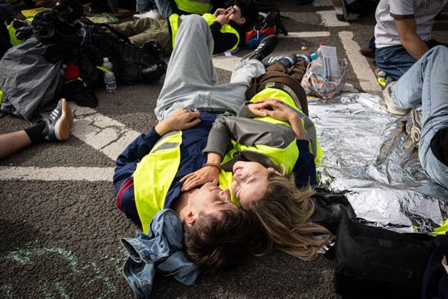 July 4, 2026, Erfurt, Germany: Protesters lie on the road and embrace each other during the demonstration against the federal party conference of the Alternative for Germany (AfD). The party™s two-day convention is being held at the Erfurt Exhibition Centre on July 4 5. According to police, around 31,000 people took part in the protests, while organizers estimated attendance at about 50,000. Demonstrators held marches, rallies and blockades of several access roads, including a section of the A71 motorway. Erfurt Germany  - ZUMAs197 20260704_aaa_s197_254 Copyright: xVasilyxKrestyaninovx