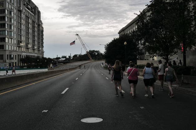 July 4, 2026, Washington, District Of Columbia, USA: People traverse a closed I-395 interstate entrance in Washington, D.C. on July 4, 2026, after the Freedom 250 Independence Day celebration on the National Mall was evacuated and portions of the event delayed to to incoming thunderstorms. Washington USA - ZUMAd227 20260704_znp_d227_001 Copyright: xBryanxDozierx
