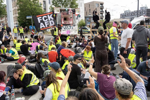 July 4, 2026, Erfurt, Germany: (EDITORS NOTE: Image contains profanity).Protesters holding placards take part in a demonstration against the federal party conference of the Alternative for Germany (AfD). The party™s two-day convention is being held at the Erfurt Exhibition Centre on July 4 5. According to police, around 31,000 people took part in the protests, while organizers estimated attendance at about 50,000. Demonstrators held marches, rallies and blockades of several access roads, including a section of the A71 motorway. Erfurt Germany - ZUMAs197 20260704_aaa_s197_266 Copyright: xVasilyxKrestyaninovx