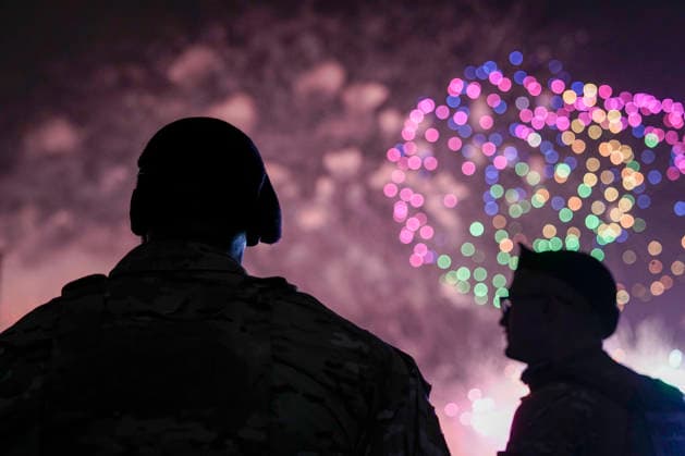 Members of the Green Berets or U.S. Army Special Forces, watch as fireworks light up the night sky over the National Mall as part of the America 250 celebrations in Washington DC on Saturday, July 4, 2026. The 35 minute July 4 fireworks show will feature 850,000 fireworks and pyrotechnic effects.  WAP20260704916 BONNIExCASH