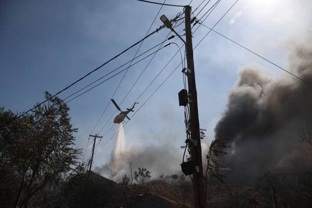 Wildfire continues near Thessaloniki as firefighters battle blaze THESSALONIKI, GREECE - JULY 5: Firefighters battle a wildfire that erupted the previous day in Oreokastro, on the outskirts of Thessaloniki, Greece on July 5, 2026. Svarnias Vasilis Anadolu Thessaloniki Greece. Editorial use only. Please get in touch for any other usage.  Copyright: x2026xAnadoluxSvarniasxVasilisx