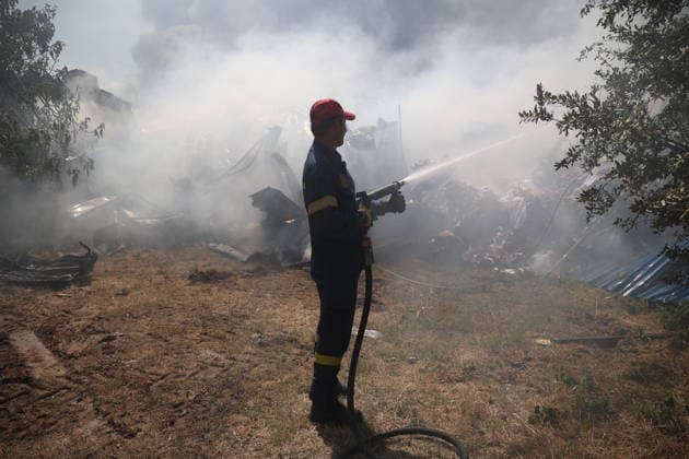 Wildfire continues near Thessaloniki as firefighters battle blaze THESSALONIKI, GREECE - JULY 5: Firefighters battle a wildfire that erupted the previous day in Oreokastro, on the outskirts of Thessaloniki, Greece on July 5, 2026. Svarnias Vasilis Anadolu Thessaloniki Greece. Editorial use only. Please get in touch for any other usage.  Copyright: x2026xAnadoluxSvarniasxVasilisx