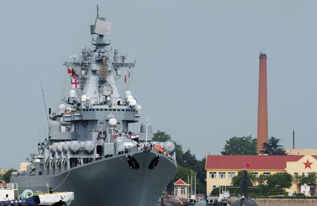 China Russia Naval Drills 9200287 05.07.2026 The Russian Pacific Fleet s guards guided-missile cruiser Varyag is towed by a tugboat at the Qingdao naval base in Shandong Province, China. Russian warships arrived in Qingdao ahead of Maritime Interaction-2026, an annual joint naval exercise held by Russia and China in the Yellow Sea from July 6 to 13. Anna Ratkoglo Sputnik Qingdao China  Copyright: xAnnaxRatkoglox