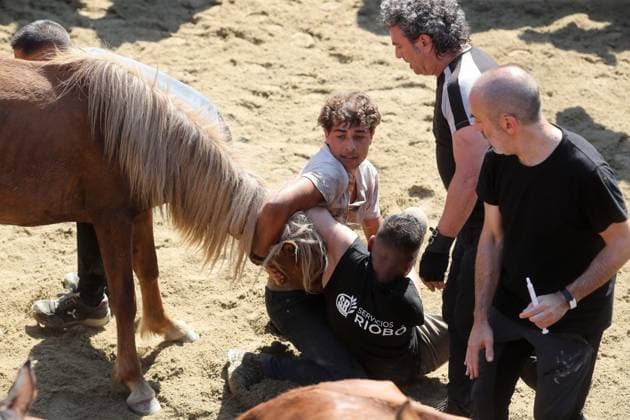 La Rapa das Bestas Celebration 2026 A Rapa das Bestas Celebration, on July 5, 2026, in Sabucedo, Pontevedra, Galicia, Spain. A Rapa das Bestas is an ancient Galician festival that involves capturing wild horses in the mountains, driving them into a fenced enclosure, and cutting their manes to deworm and care for them. It is a ritual of strength and tradition that symbolizes the coexistence of humans and nature, celebrated primarily in Sabucedo. JULY 5, 2026 Sabucedo, Pontevedra, Galicia, Sabucedo, Pontevedra, Galicia, Spain  Copyright: xCarlosxCastrox 7646519