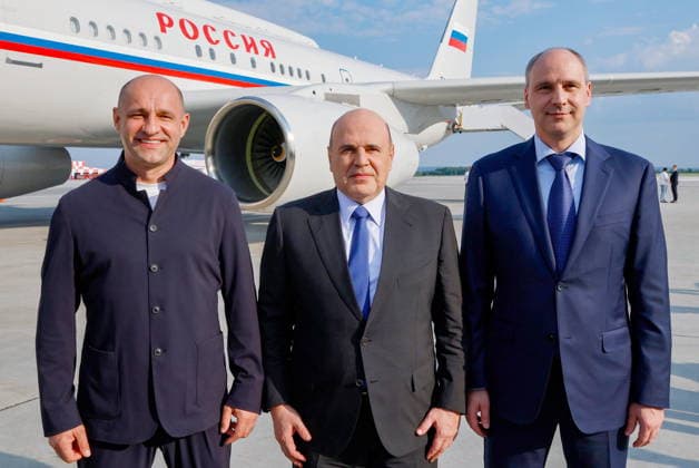 News Themen der Woche KW27 RUSSIA, YEKATERINBURG - JULY 5, 2026: Presidential Plenipotentiary Envoy to the Ural Federal District Artyom Zhoga, Russia s Prime Minister Mikhail Mishustin and Sverdlovsk Region Governor Denis Pasler (L-R) pose for a photograph at Koltsovo International Airport. Mikhail Mishustin is on a working visit to Yekaterinburg to participate in the 16th Innoprom International Industrial Exhibition, which is taking place on 6-9 July. Dmitry Astakhov POOL TASS  94709175