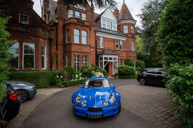 July 5, 2026, London, United Kingdom: A classic blue Renault Alpine A110, parked in the drive of a large British suburban house. The Southside Hustle Car Meet is held on Wimbledon Common in Southwest London every first Sunday of the month. This free community event attracts owners of classic cars, supercars, sports cars, and rare or modified vehicles. Car enthusiasts, photographers, and families gather to admire an impressive variety of cars, meet like-minded people, and enjoy the welcoming atmosphere in the scenic surroundings of Wimbledon Common. London United Kingdom  - ZUMAs197 20260705_aab_s197_010 Copyright: xJamesxWilloughbyx