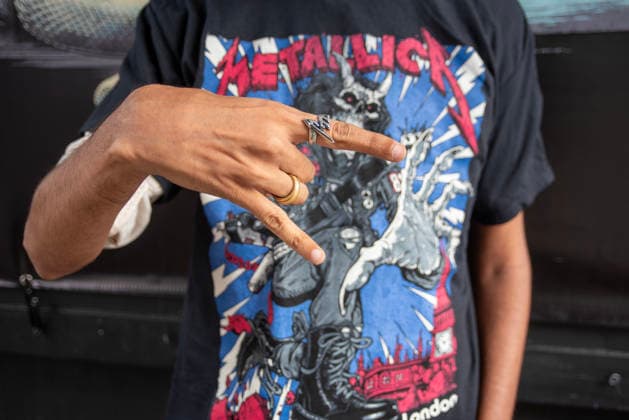 Metallica fans by the pop up ship in London, UK - 5Jul 2026 A fan shows his Metallica ring outside of the pop up shop in London. Metallica heavy metal band is having two concerts in London over the weekend as part of the M72 World Tour. Hundreds of Metallica fans were seen queuing up to buy some memorabilia by the Metallica pop up shop which is open for 4 days in London, UK. London United Kingdom Copyright: xKrisztianxElekx xSOPAxImagesx SSS_20260705_POPUP_SHOP_0011005062